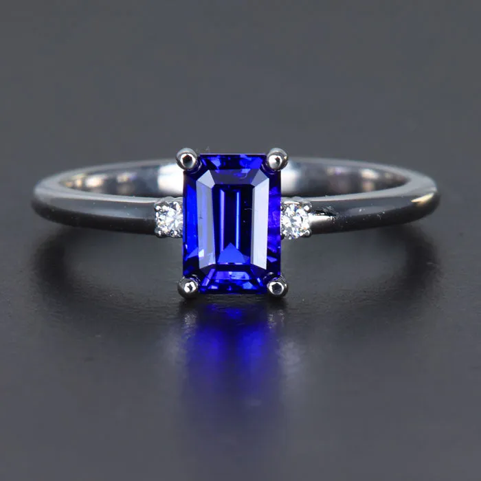 14k White Gold Emerald Cut Tanzanite Ring with Two Side Diamonds 1.26 Carats
