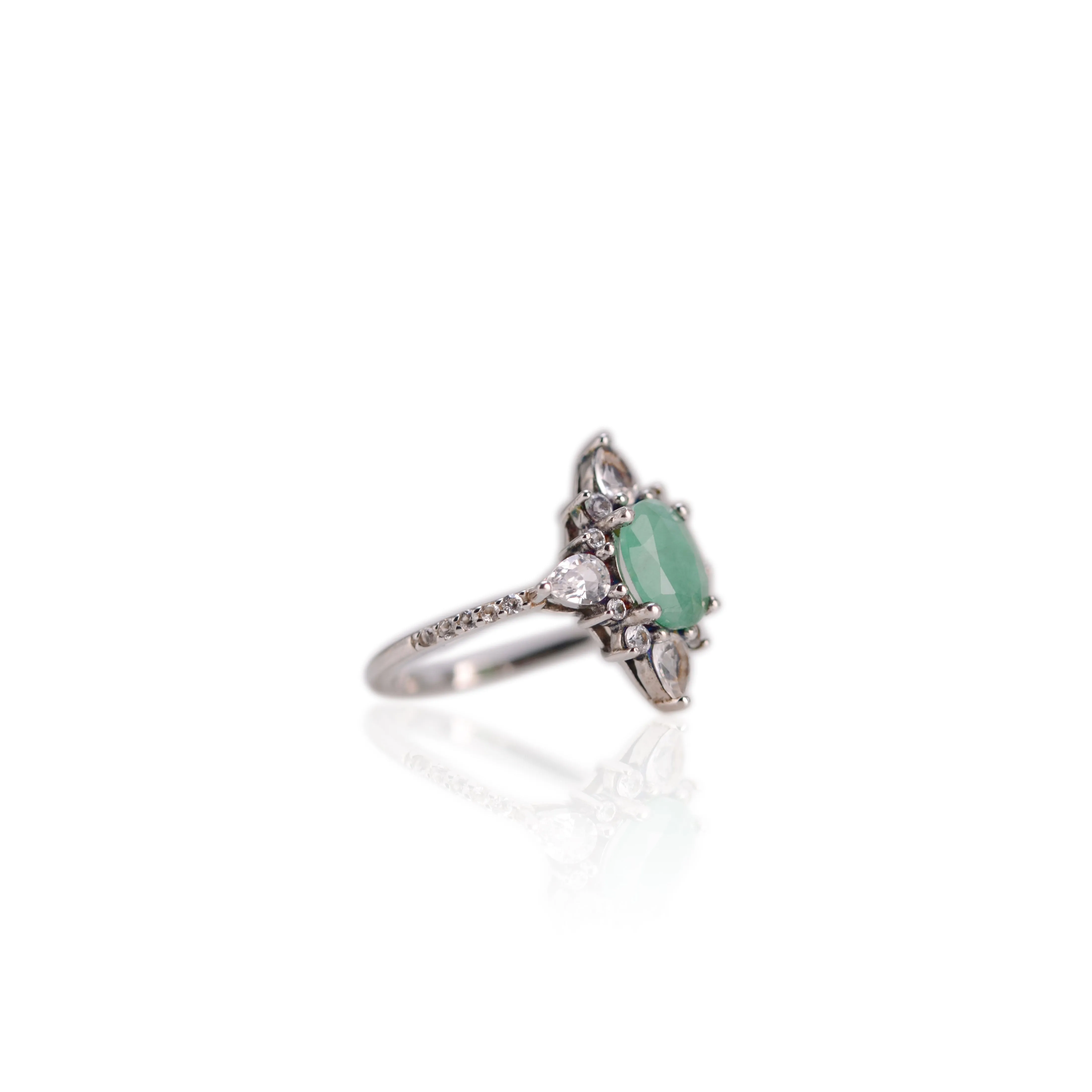 6 x 8 mm. Oval Cut Green Zambian Emerald with Topaz Accents Ring