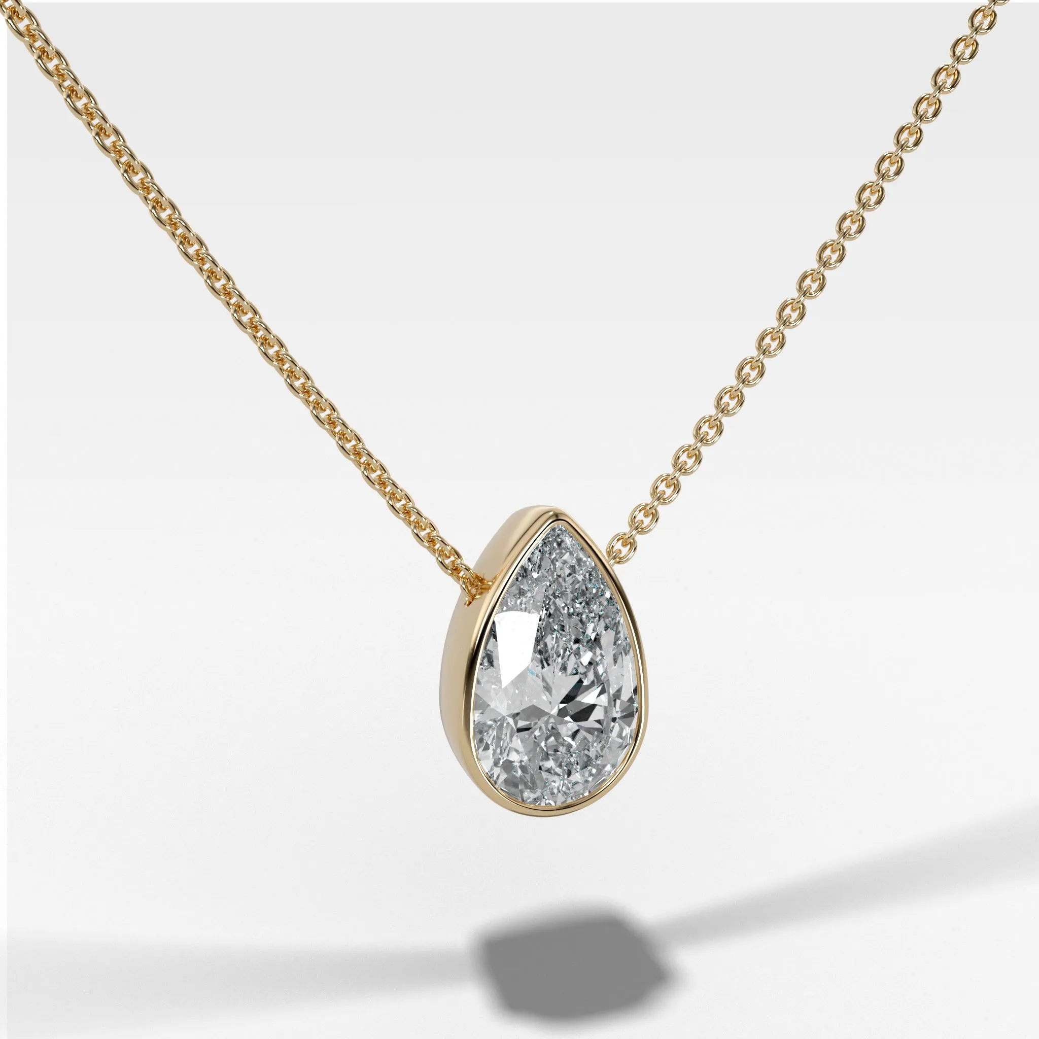 Bezel Pendant Necklace with Pear Cut Diamond