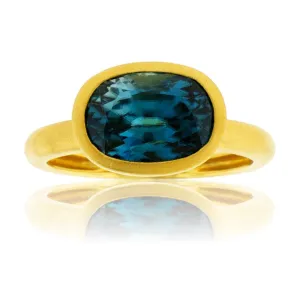 Bezel Set Modified Cushion-Cut Blue Zircon Yellow Gold Ring