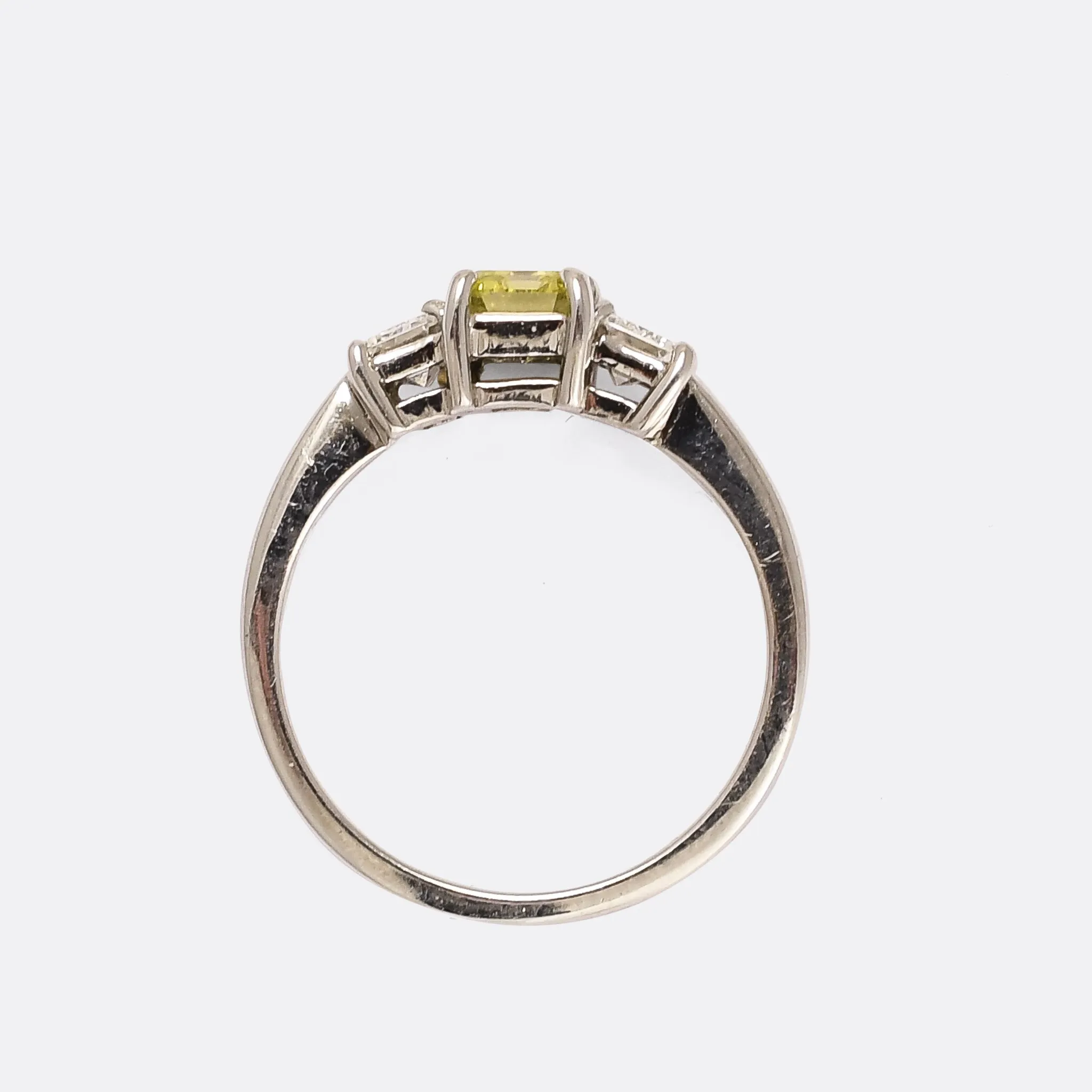 Contemporary Fancy Vivid Yellow Emerald Cut Diamond Trilogy Ring