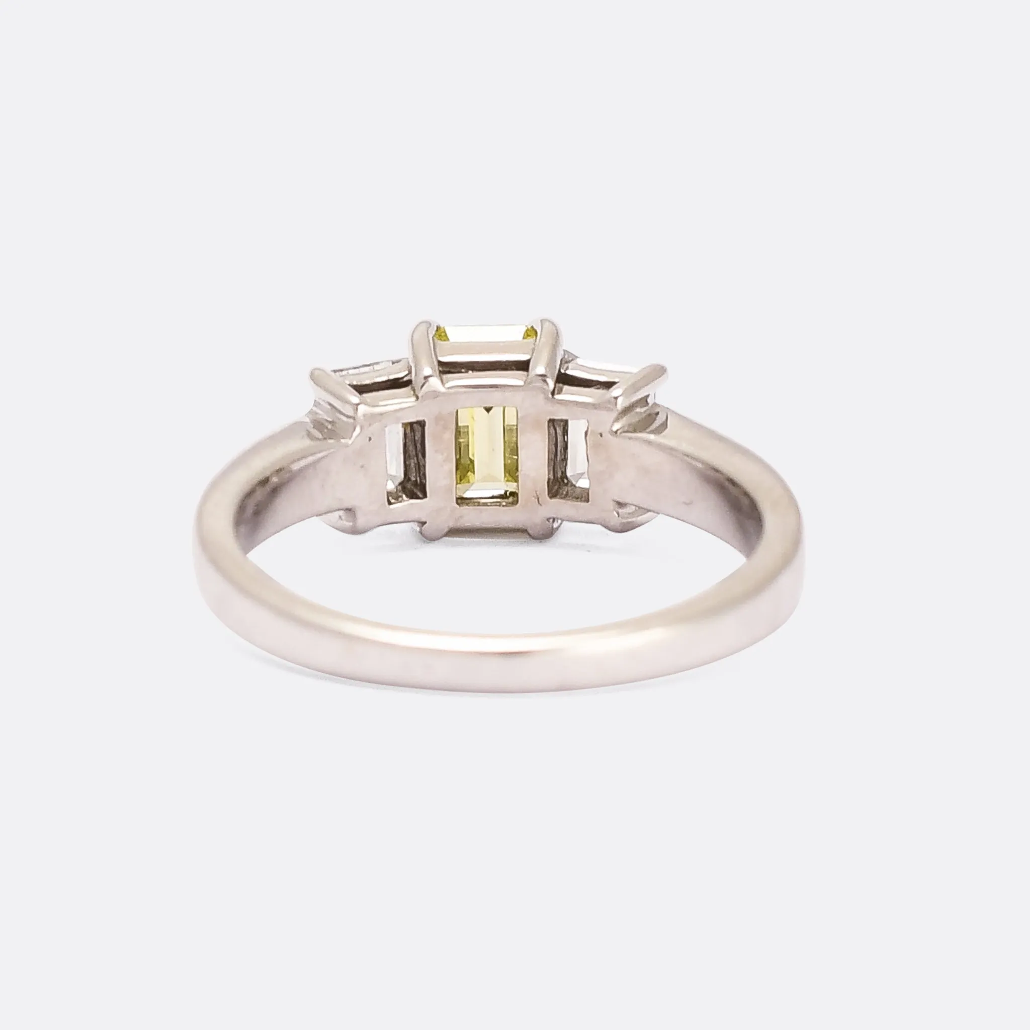 Contemporary Fancy Vivid Yellow Emerald Cut Diamond Trilogy Ring