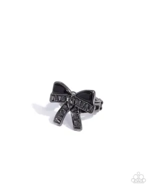 Delivering Dazzle - Black - Shell and Smoky Gem Gunmetal Bow Paparazzi Dainty Ring