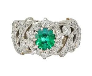 Edwardian 1.85 CTW Emerald Diamond Platinum 14 Karat Yellow Gold Scrolling Antique Halo Ring
