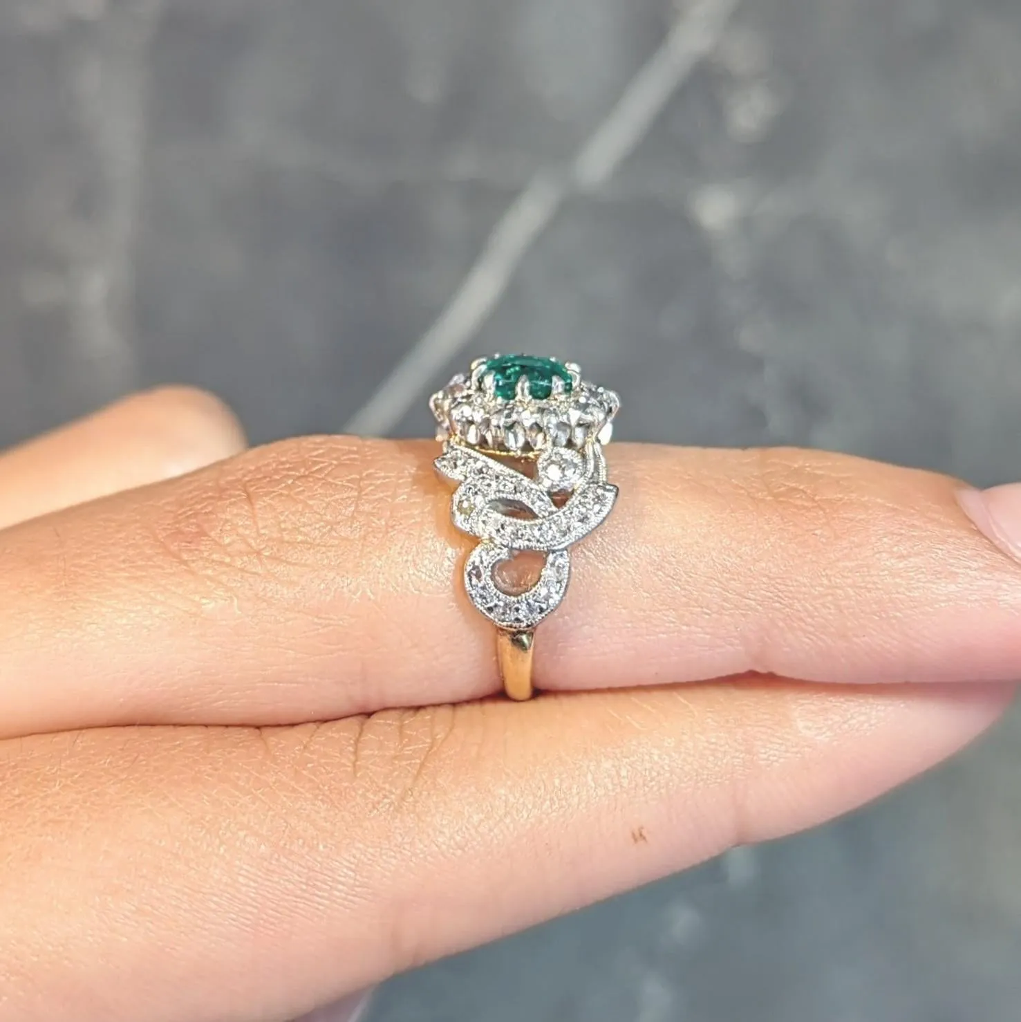 Edwardian 1.85 CTW Emerald Diamond Platinum 14 Karat Yellow Gold Scrolling Antique Halo Ring