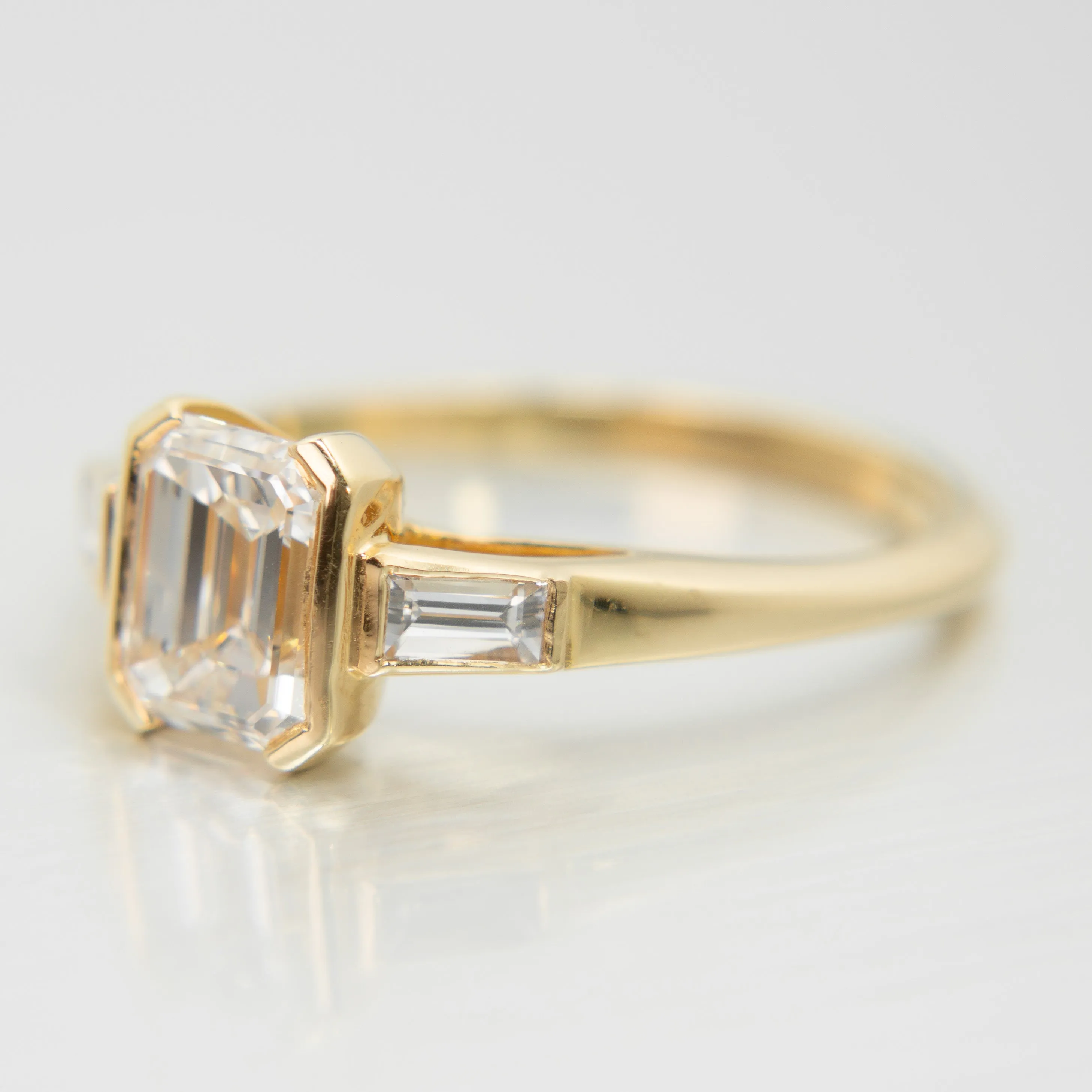 Emerald Cut Diamond Trilogy Ring in 18k Yellow Gold