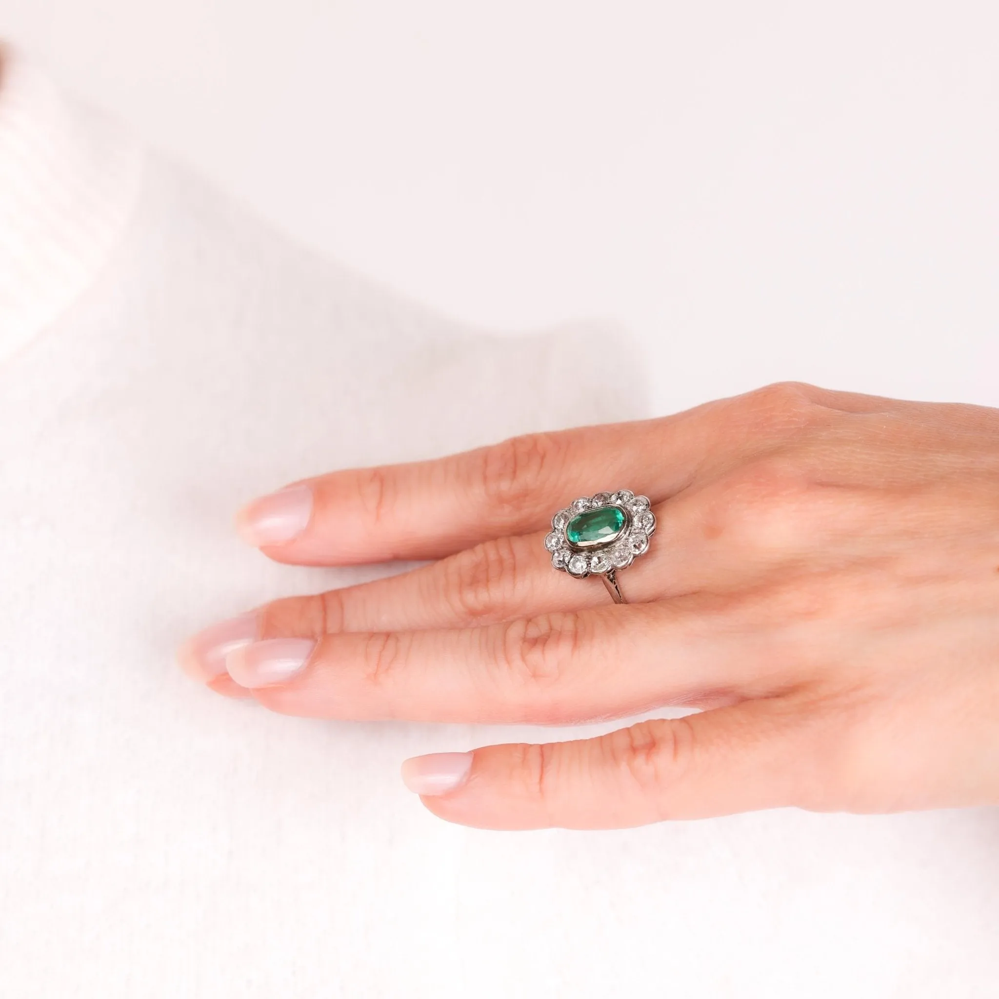 GIA 1.60 carat oval cut emerald diamond platinum cluster ring
