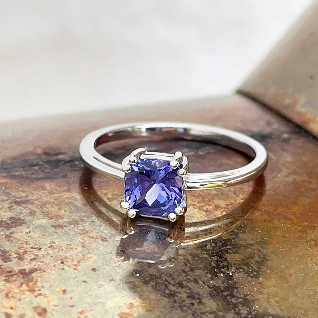 Gracefully Elevated Cushion Cut Four Claw White Gold Tanzanite Ring