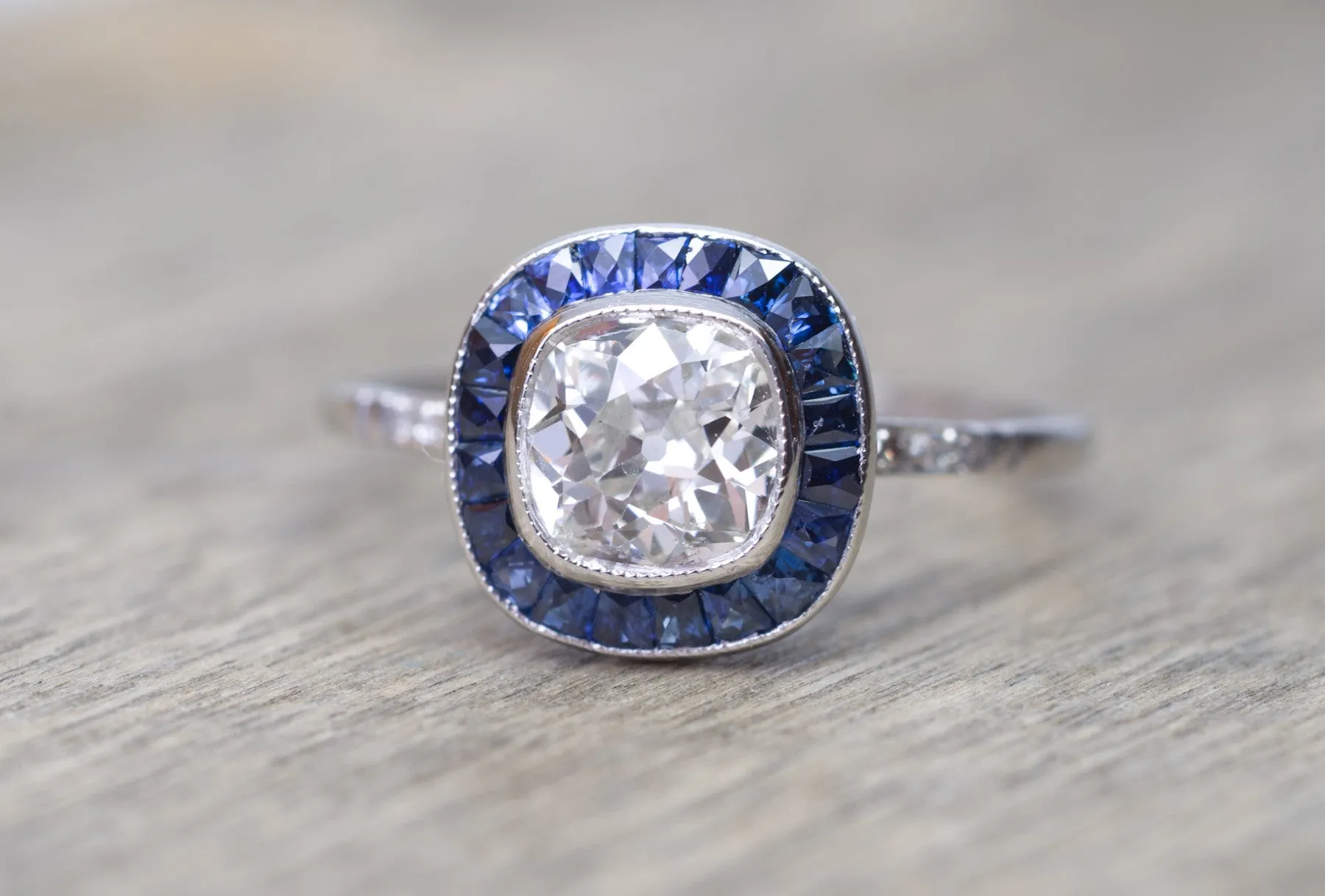 OLD MINE CUSHION CUT DIAMOND AND SAPPHIRE TARGET RING