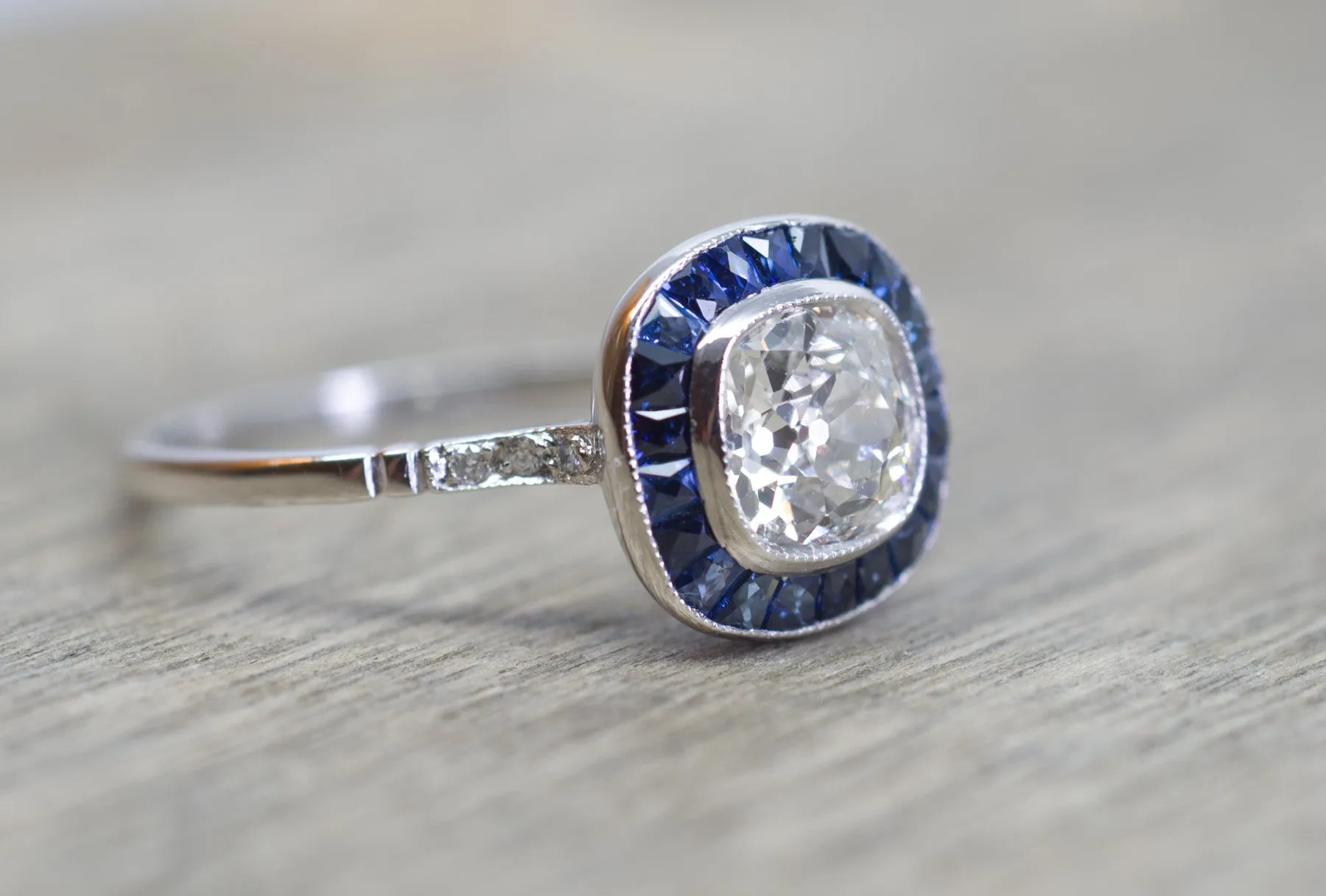 OLD MINE CUSHION CUT DIAMOND AND SAPPHIRE TARGET RING