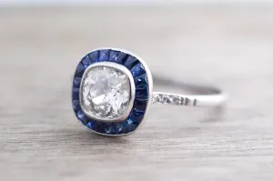 OLD MINE CUSHION CUT DIAMOND AND SAPPHIRE TARGET RING