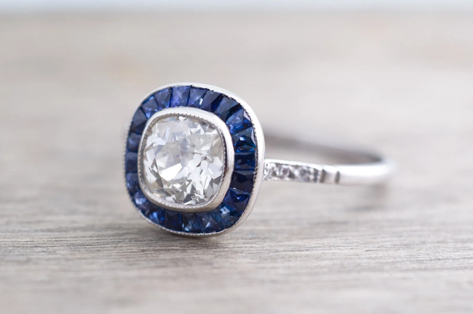 OLD MINE CUSHION CUT DIAMOND AND SAPPHIRE TARGET RING