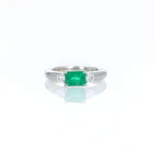 Platinum 0.71 Carat Emerald Diamond Three Stone Ring