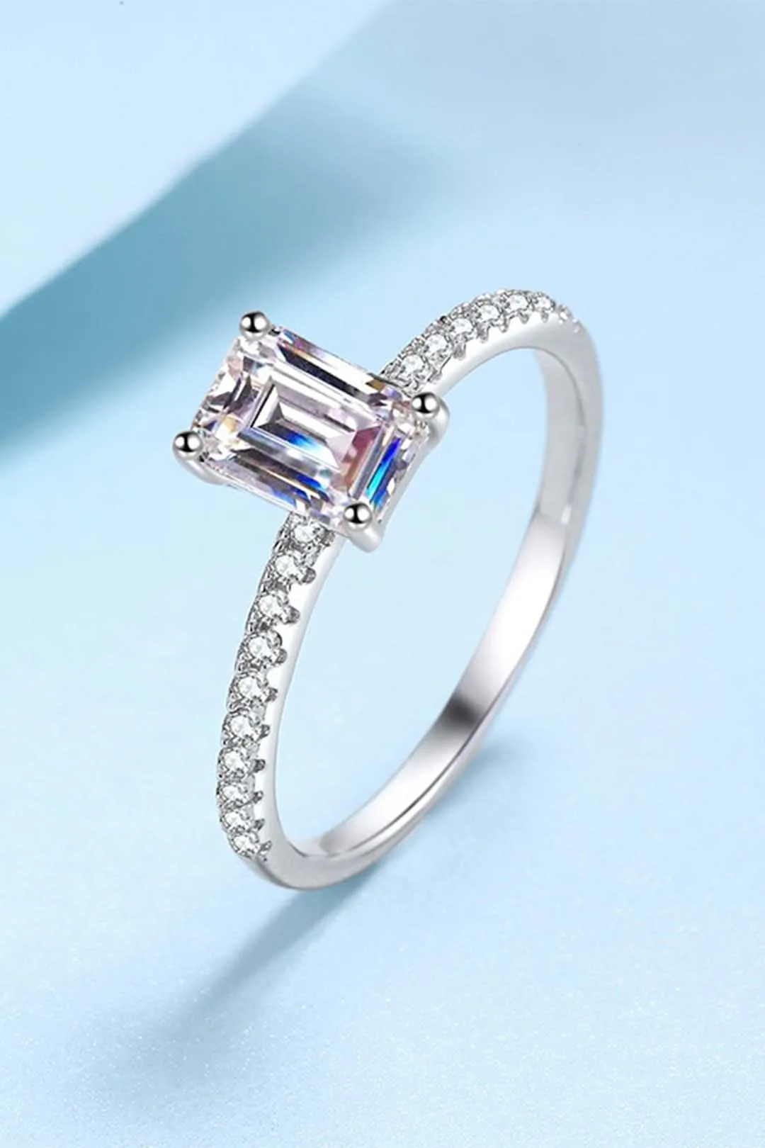 Seraphina Emerald Cut Solitaire Moissanite Ring in Sterling Silver with Platinum Coating