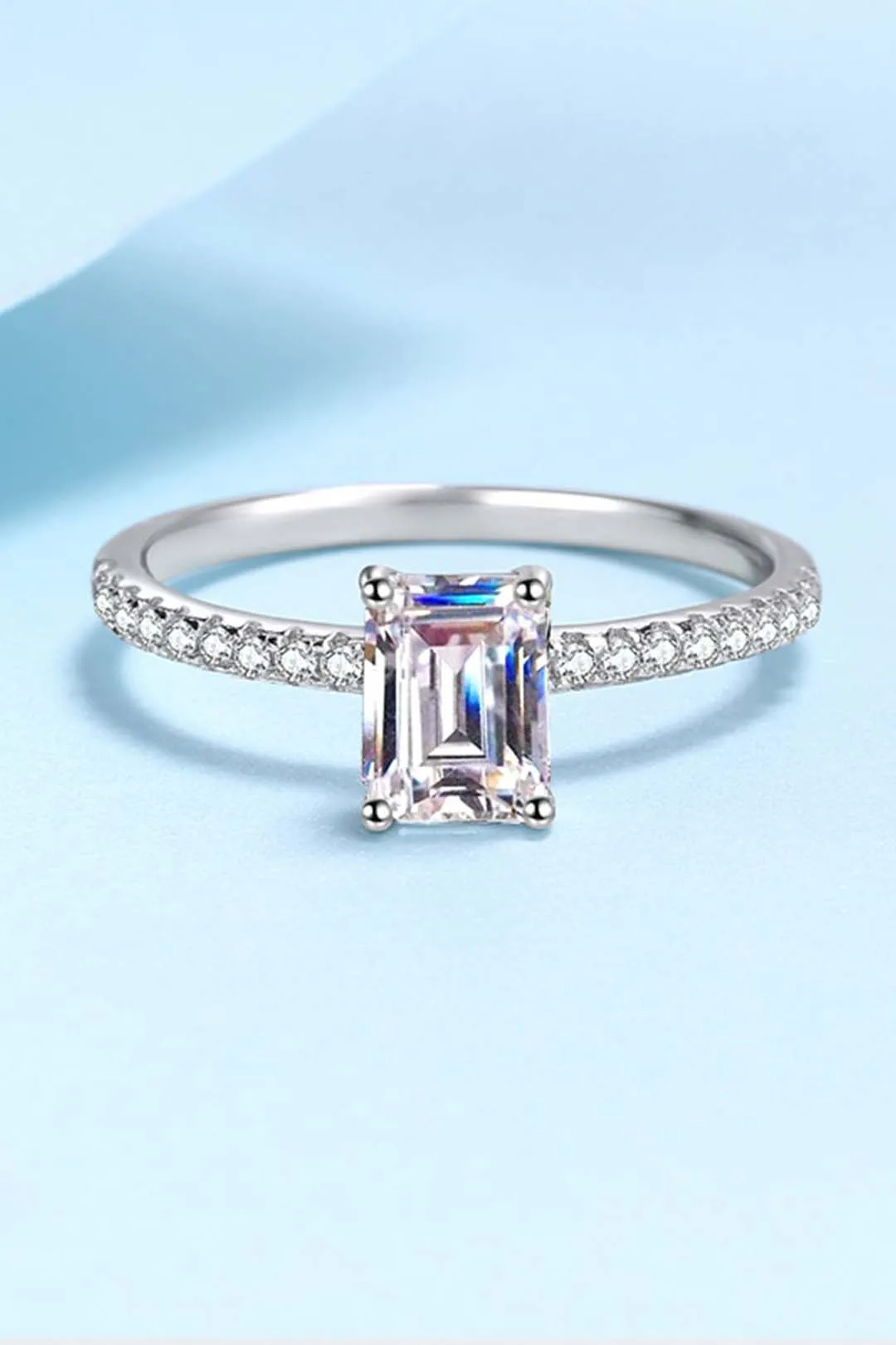 Seraphina Emerald Cut Solitaire Moissanite Ring in Sterling Silver with Platinum Coating