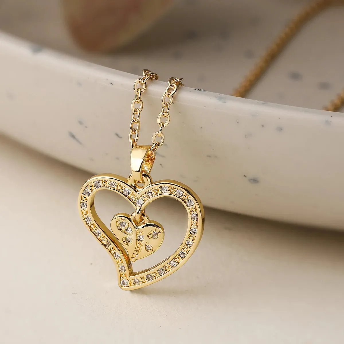 Shimmering Diamond Accented Heart Necklaces