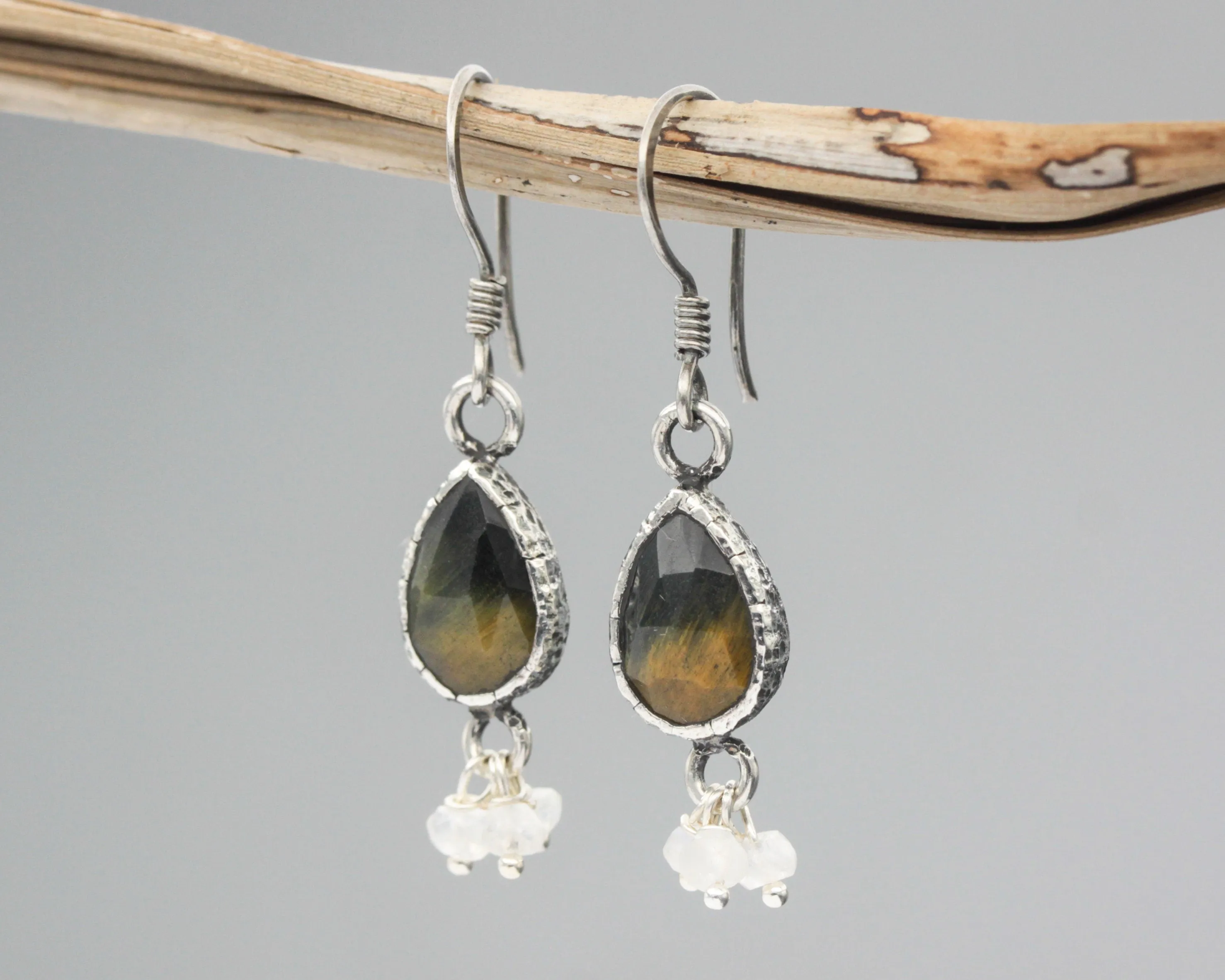 Teardrop Tiger's Eye earrings in silver bezel setting with moonstone beads on oxidized sterling silver hooks