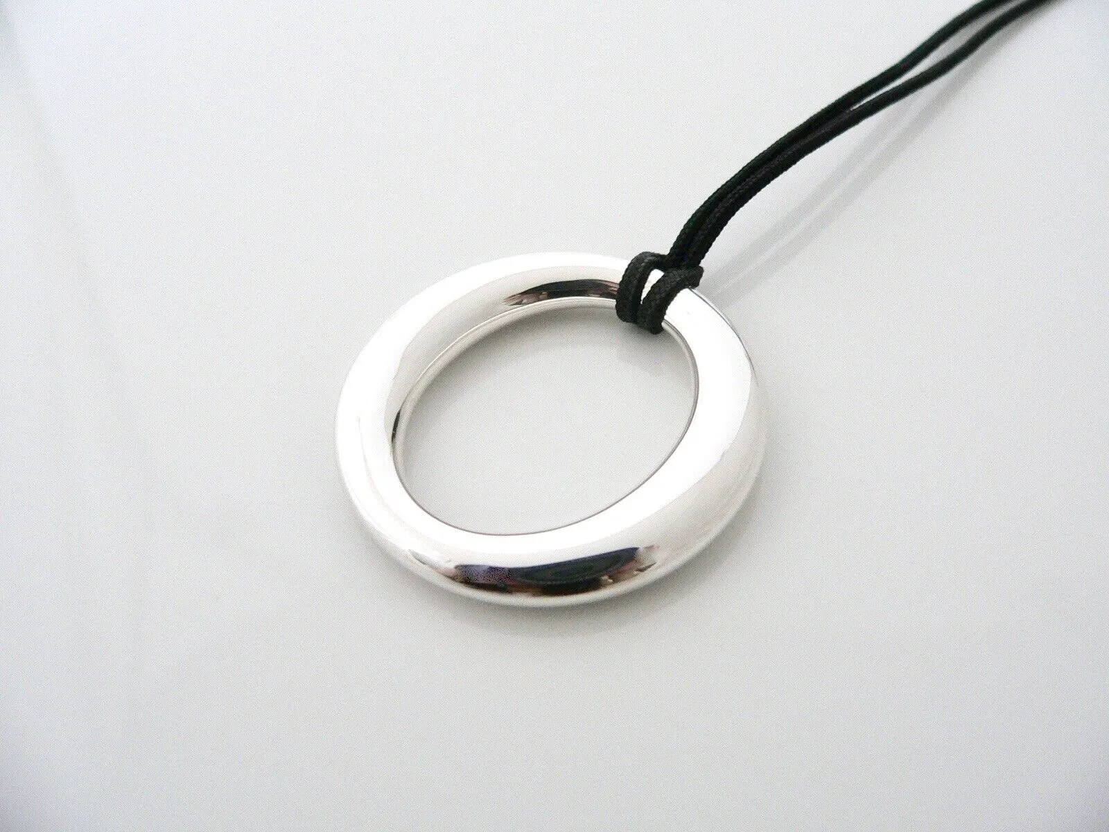 Tiffany & Co Sevillana Necklace Peretti 1.5 Inch Pendant  19 In Silk Cord Love