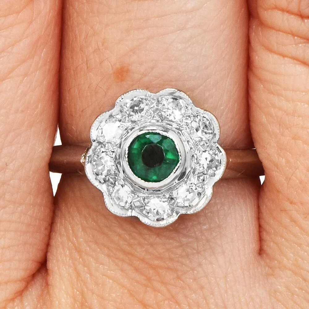 Vintage Emerald and Diamond Floral Halo Ring in Platinum